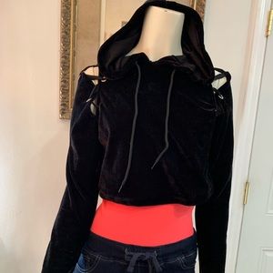 Black hooded sweatshirt with lace up shoulders.